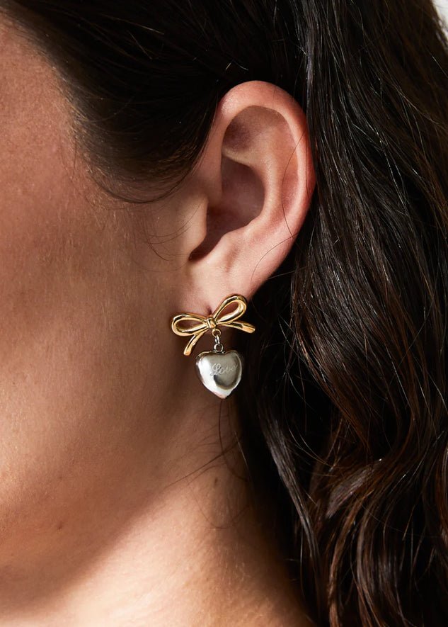 ORECCHINI FIOCCO E CUORE ACC.INO. ORO/ARG. NALI - Fanatica Boutique